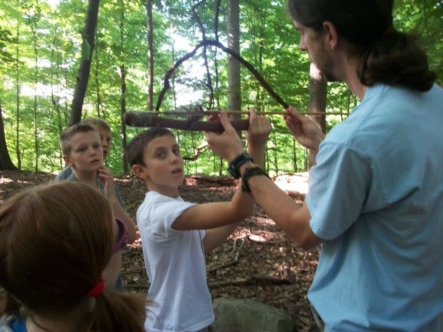 Martin explains how to use a spear and atlatl, as the Paleo Indians would have used in the Ice Age.