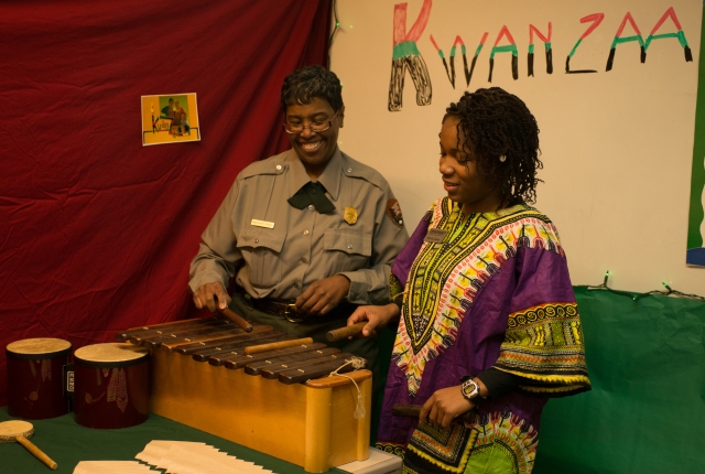 Ranger Margaret and Intern Mysha teach guests about Kwanzaa.  Credit: Tim Fenner